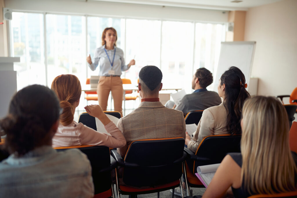 A group of professionals engaged in a serious training session.